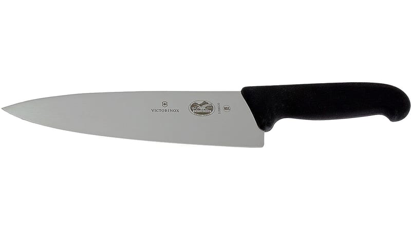 Victorinox Fibrox Pro 8-inch chef's knife on a white background, black textured handle and a plain stainless blade stamped 5.2063.20